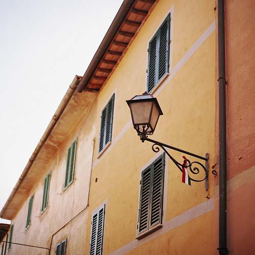 window black metal sconce lantern shutter